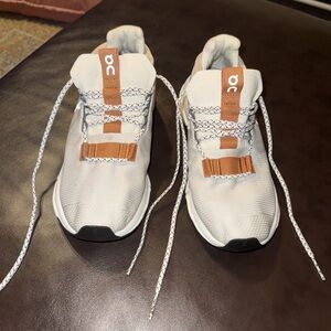 On Running Cream and Tan Athletic Shoes